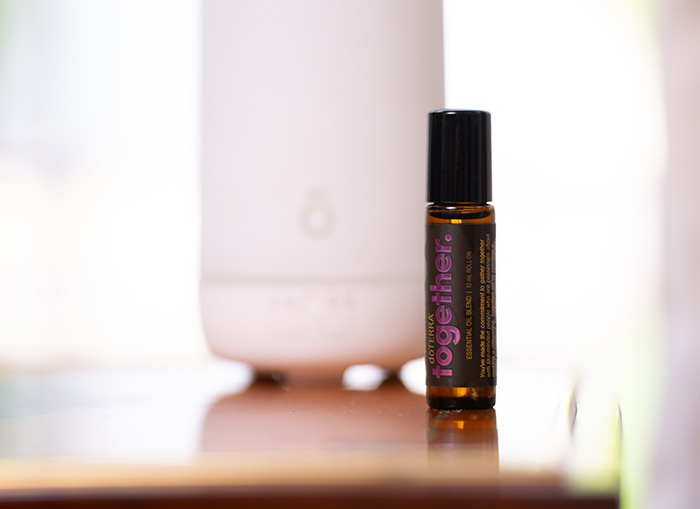 A bottle of Together in front of a diffuser