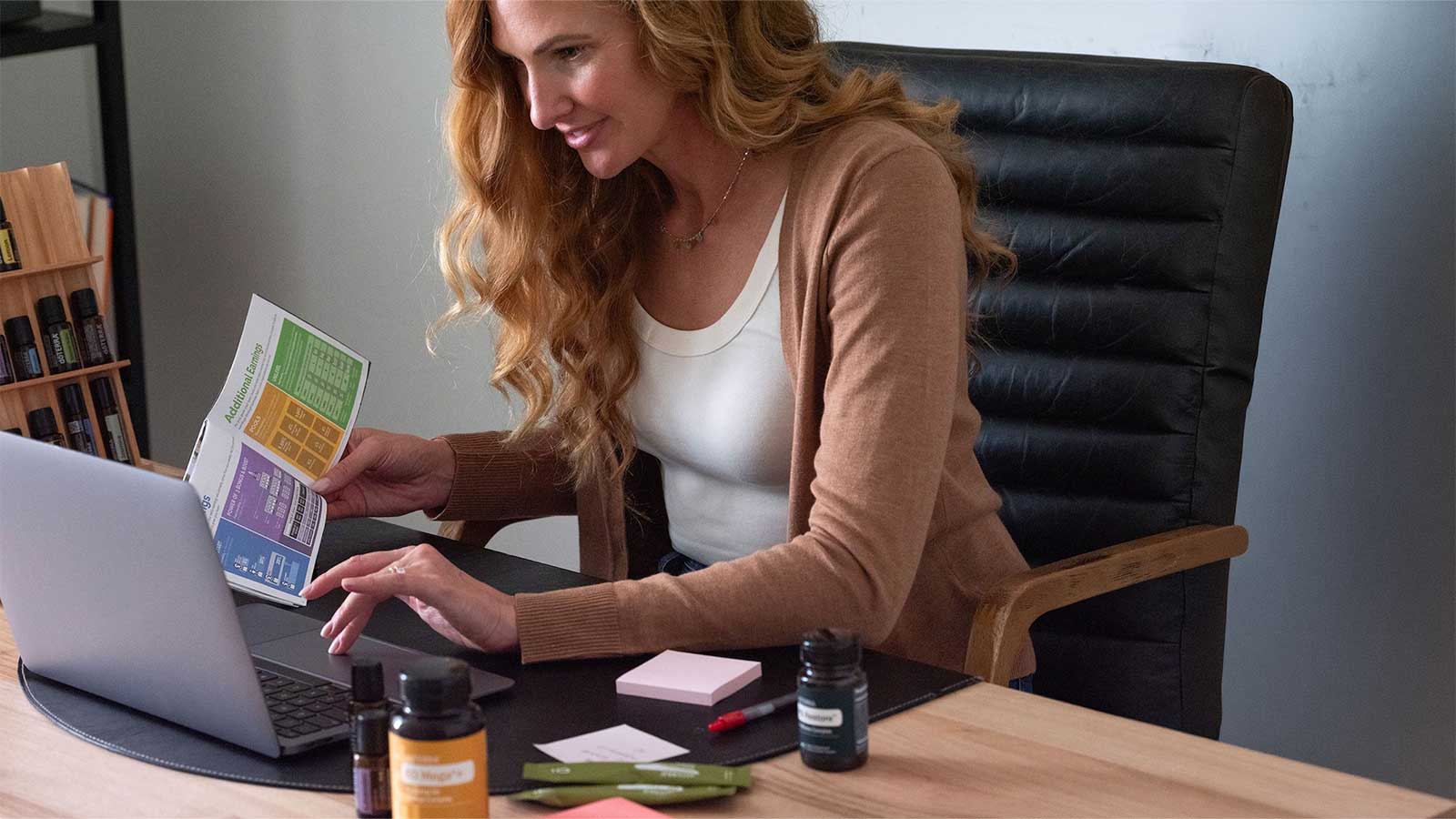 Woman reading at her computer