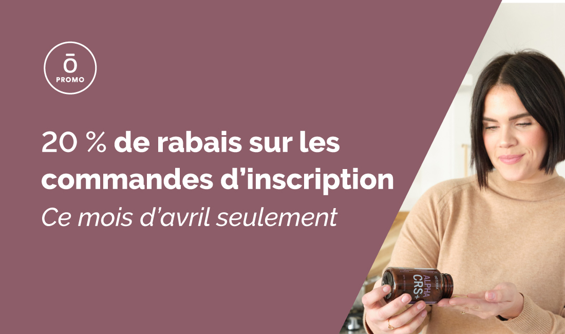 Woman with bottle of doTERRA product.