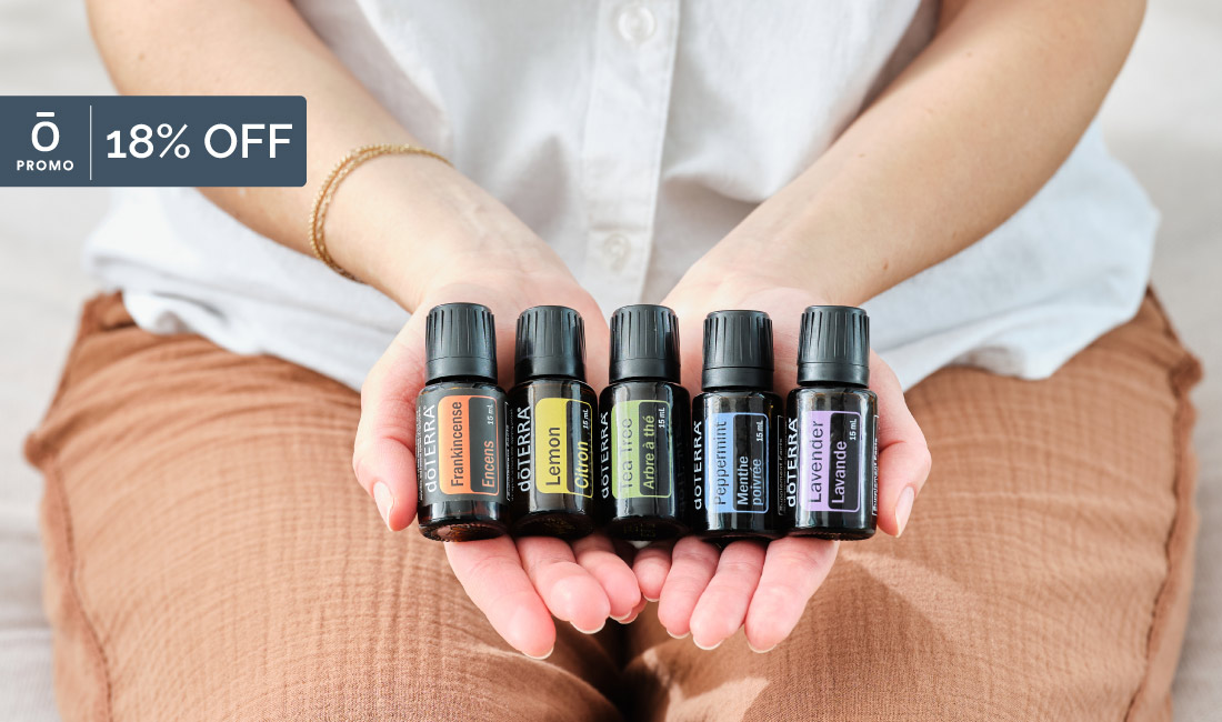 Row of products held in hands.