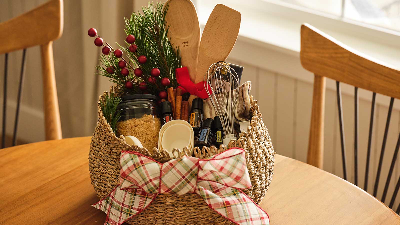 Basket containing essential oils and baking instruments 