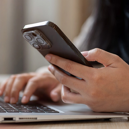 A closeup of someone holding a phone