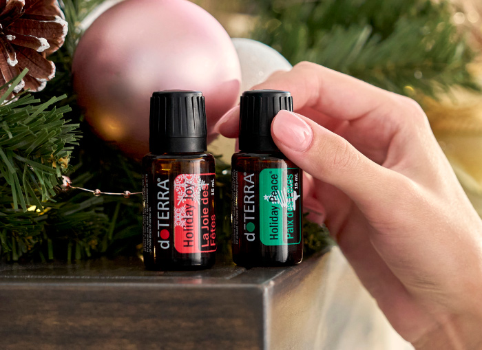 Holiday Peace and love oils on shelf.