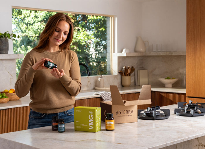 Woman taking doTERRA supplements