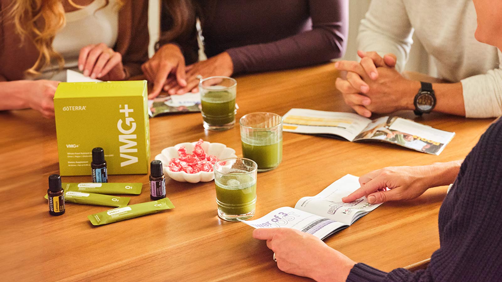 People talking at a table with VMG
