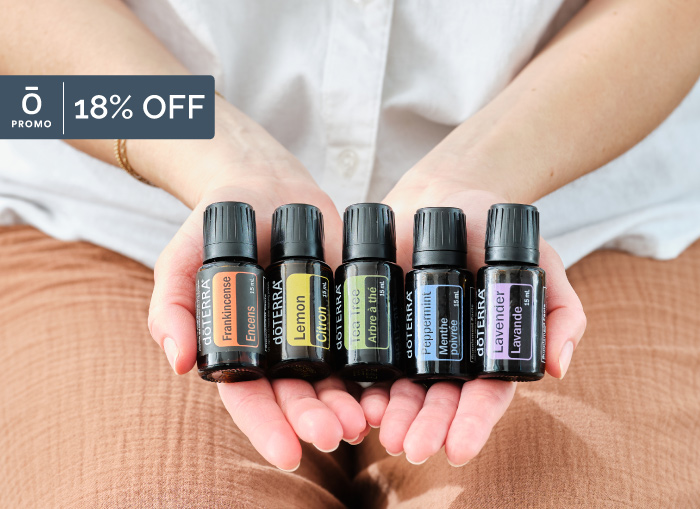 Row of products held in hands.