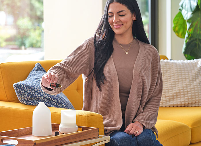 Woman putting on guard in diffuser