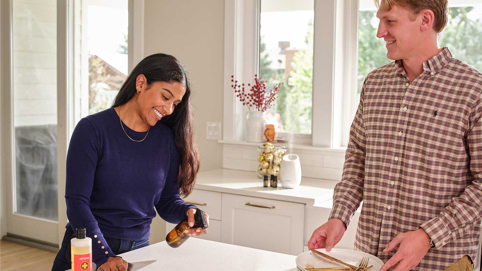 Two people cleaning with on guard cleaners