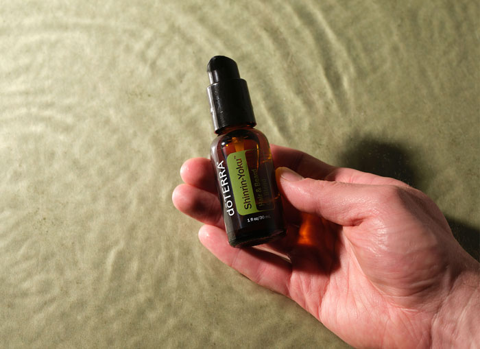 Hand holding SHinrin-Yoku beard oil