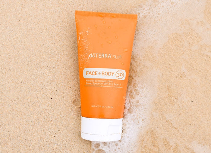 Sunscreen lotion in the sand