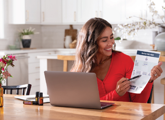 Lady showing new doterra comp plan