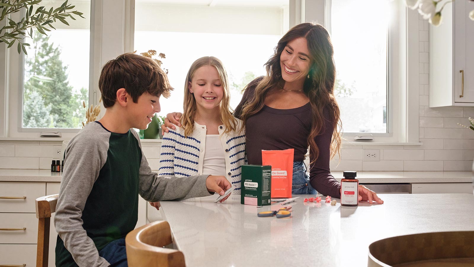 Smiling family trying doTerra OnGuard products